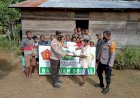 Kapolsek Mandobo Laksanakan Pembagian Beras Bersama Bhabinkamtibmas dan Bhabhinsa Tanah Merah