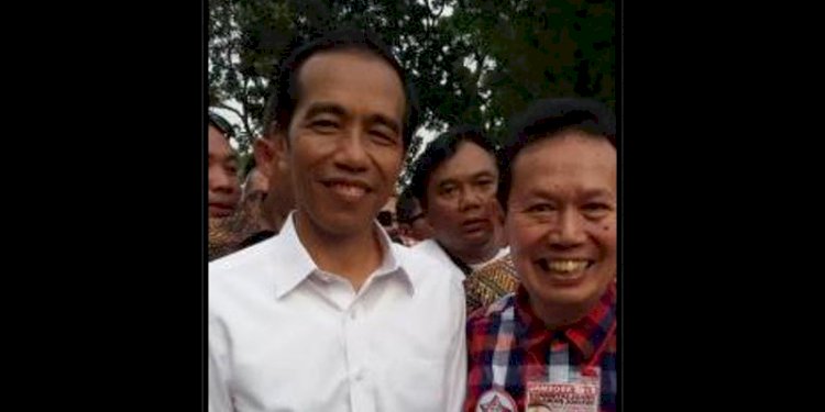 Ketua Relawan Pro Jokowi Amin (Projamin), Ambroncius Nababan saat bersama Presiden Joko Widodo/Net