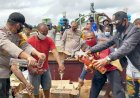 Bersama Warga Masyarakat Polres Boven Digoel Musnahkan Barang Bukti Miras