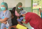 Tenaga Kesehatan Puskesmas Subur Kabupaten Boven Digoel, Terima Vaksinasi Covid-19 Tahap 1