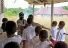 TINGKATKAN KEDISIPLINAN SISWA-SISWI SD YPPK KAMPUNG KAWAGIT, PERSONIL SATGAS TMMD LATIHKAN PBB