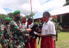 Satgas Yonif 611/Awang Long Salurkkan Bantuan Tas dan Alat Tulis Untuk Pelajar Papua