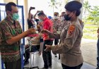 Rayakan HUT Bhayangkara ke 75, Membagikan Secangkir Kopi Kepada Warga