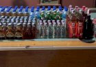 Ciptakan Kamtibmas Jelang Nataru, Kapolsek Jair Razia Ratusan Botol Miras Berlebel
