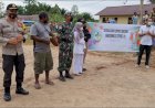 Kapolsek Bomakia Berikan Sosialisasi Pentingnya Vaksinasi Covid-19, pada Pembukaan Pertandingan Bola Voli di Distrik Bomakia Boven Digoel