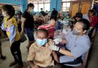 78 Anak Usia 6-11 Tahun Mendapatkan Vaksinasi  Presisi Polresta Jayapura Kota