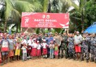 Pererat Sinergitas, Jelang HUT RI 2022 jajaran TNI-Polri Di Merauke, Serahkan Paket Sembako dan Bendera Merah Putih di Perkampungan Pedalaman OAP