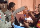 Polsek Kimaam dan TNI, Amankan Puluhan Botol Miras Lokal Jenis Sopi