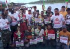 Peringati HUT TNI Ke-77 Koramil 1707/07 Kepi Posramil Cabang Tiga Selenggarakan Lomba Dayung Dan Balap Speedboat