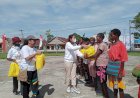 Momentum Hari Ibu Ke-94, TP-PKK Kab. Mappi Gelar Jalan Santai, Bersih-bersih Jalan dan Berbagi Sembako Pada Mama-mama Papua
