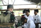 Babinsa Koramil Senggo 0707-14/ Senggo Dampingi Kegiatan Posyandu Balita