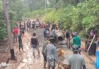 Hujan Tak Surutkan Semangat Satgas TMMD Kodim 1711/BVD Selesaikan Pengecoran Jalan