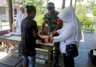 Babinsa Koramil Atsj Dukung Kesehatan Balita, Gelar Posyandu di Kampung Atsj Asmat