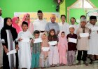 Momen 10 Muharram 1446 H, Kaka Besar PW Sentuh Anak Yatim di Masjid Al Asri Abepura