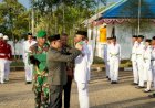 Semangat Kemerdekaan di Mappi: Pengukuhan Paskibra dan Pawai Obor Dipimpin oleh Dr. Michael R. Gomar