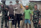 Sinergitas TNI, Polri, dan Dinkes Laksanakan Penyemprotan IRS untuk Cegah Penyebaran Nyamuk Malaria di Distrik Ninati