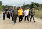 HUT Bhayangkara ke-79, Polres Boven Digoel Pererat Sinergi Lewat Jalan Sehat dan Senam